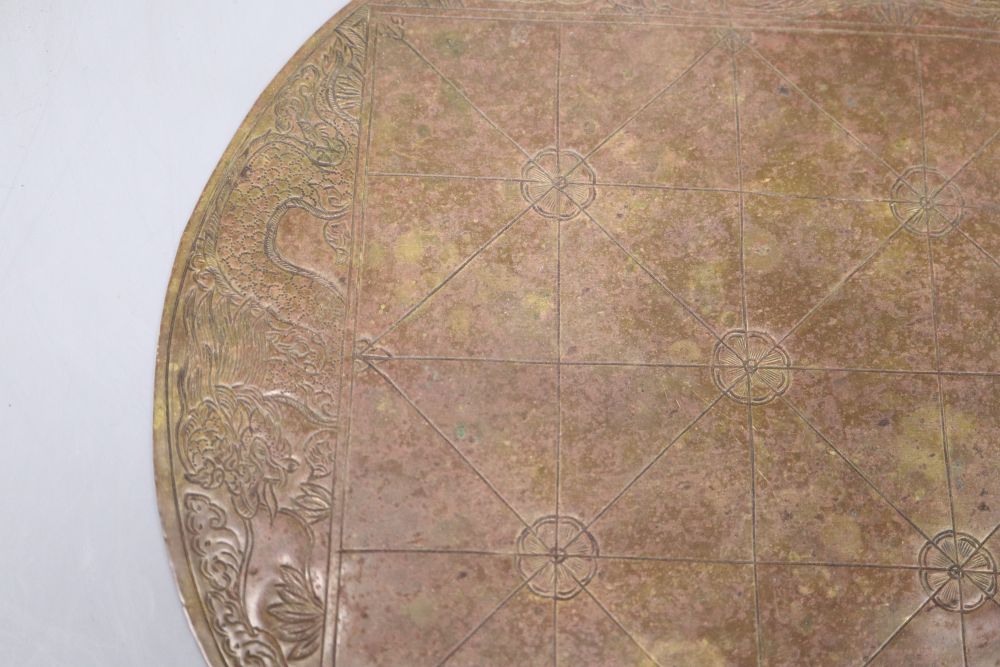 A Chinese 19th century brass games board, diameter 24cm